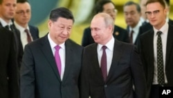 Ông Tập Cận Bình và ông Vladimir Putin gặp nhau ở Moscow, Nga, ngày 5/6/2019. 