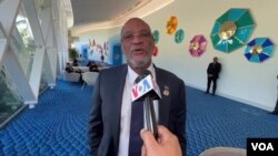 Foto Achiv: Premye Minis Ariel Henry pandan yon entevyou ak Valerio Saint Louis nan Nassau, Bahamas, kote rankont lide CARICOM yo ap dewoule. 