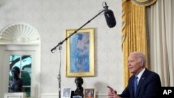 President Joe Biden addresses the nation from the Oval Office of the White House in Washington, July 24, 2024, about his decision to drop his Democratic presidential reelection bid. (Pool via AP)