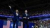 Democratic presidential nominee Vice President Kamala Harris and her running mate Minnesota Gov. Tim Walz arrive at a campaign rally in Philadelphia, Aug. 6, 2024.