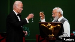 Tổng thống Mỹ Biden và Thủ tướng Ấn Độ Modi trong quốc yến ở Washington hôm 22/6/2023.