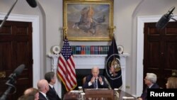 FILE - President Joe Biden holds a meeting about countering the flow of fentanyl into the United States, in the Roosevelt Room at the White House, in Washington, Nov. 21, 2023.