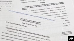 Dokiman legal Depatman Jistis Etazini prezante bay tribinal federal sid Florid la pou mande'l rann piblik manda ki te otorize FBI fouye kay ansyen Prezidan Donald Trump nan eta Florid la. 