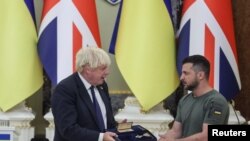 UKRAINE-CRISIS/BRITAIN-JOHNSON