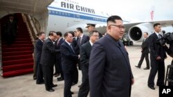 Ông Kim Jong Un tại phi trường Changi của Singapore hôm 10/6.