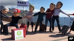 Hình minh họa của Oxfams về các nhà lãnh đạo G-7 với Thỏa thuận Khí hậu Paris 2015.