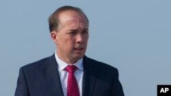 Bộ trưởng Di trú Australia Peter Dutton bác bỏ cáo buộc của Hội Ân xá Quốc tế.