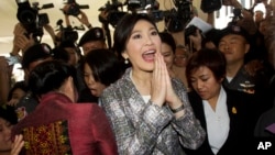 Cựu Thủ tướng Thái Lan Yingluck Shinawatra, tại Quốc hội ở Bangkok, ngày 22/1/2015. Hiện có những tin đồn là bà Yingluck có thể trốn ra nước ngoài để khỏi bị tù như anh của bà, ông Thaksin Shinawatra.