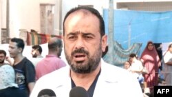 An image grab from a file handout video released by the Hamas Media Office, shows doctor Mohammad Abu Salmiya, director of Al-Shifa hospital in Gaza City, giving a press briefing on on November 1, 2023 regarding the repercussions of fuel shortages on the 