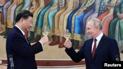 Tổng thống Nga Vladimir Putin đang rất cần sự ủng hộ của Chủ tịch Trung Quốc Tập Cận Bình