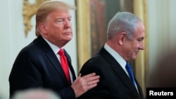 Tổng thống Mỹ Donald Trump và Thủ tướng Israel Benjamin Netanyahu tại cuộc họp báo chung về kế hoạch hòa bình Trung Đông của Tổng thống Trump tại Tòa Bạch Ốc ngày 28/1/2020. 