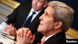 Ngoại trưởng Mỹ John Kerry đối mặt Ngoại trưởng Iran Javad Zarif (không có trong ảnh) trong 1 cuộc họp tại Vienna, 21/11/2014.