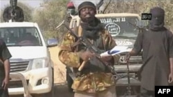 Hình ảnh từ đoạn video của nhóm Hồi giáo cực đoan ở Nigeria, Boko Haram, do hãng thông tấn AFP có được cho thấy thủ lĩnh nhóm này, Abubakar Shekau, đang truyền đi một thông điệp, 20/1/2015. 