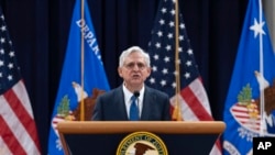 Attorney General Merrick Garland speaks to the U.S. attorneys gathered for their annual conference at the Department of Justice headquarters in Washington, Sept. 12, 2024.