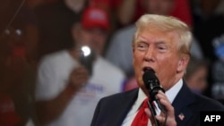 Former US President and 2024 Republican presidential candidate Donald Trump speaks during a campaign rally at the Georgia State University Convocation Center in Atlanta, Georgia, on August 3, 2024. (Photo by CHRISTIAN MONTERROSA / AFP)