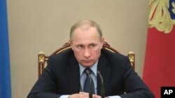 Ông Putin trong cuộc họp nội các tại điện Kremlin.