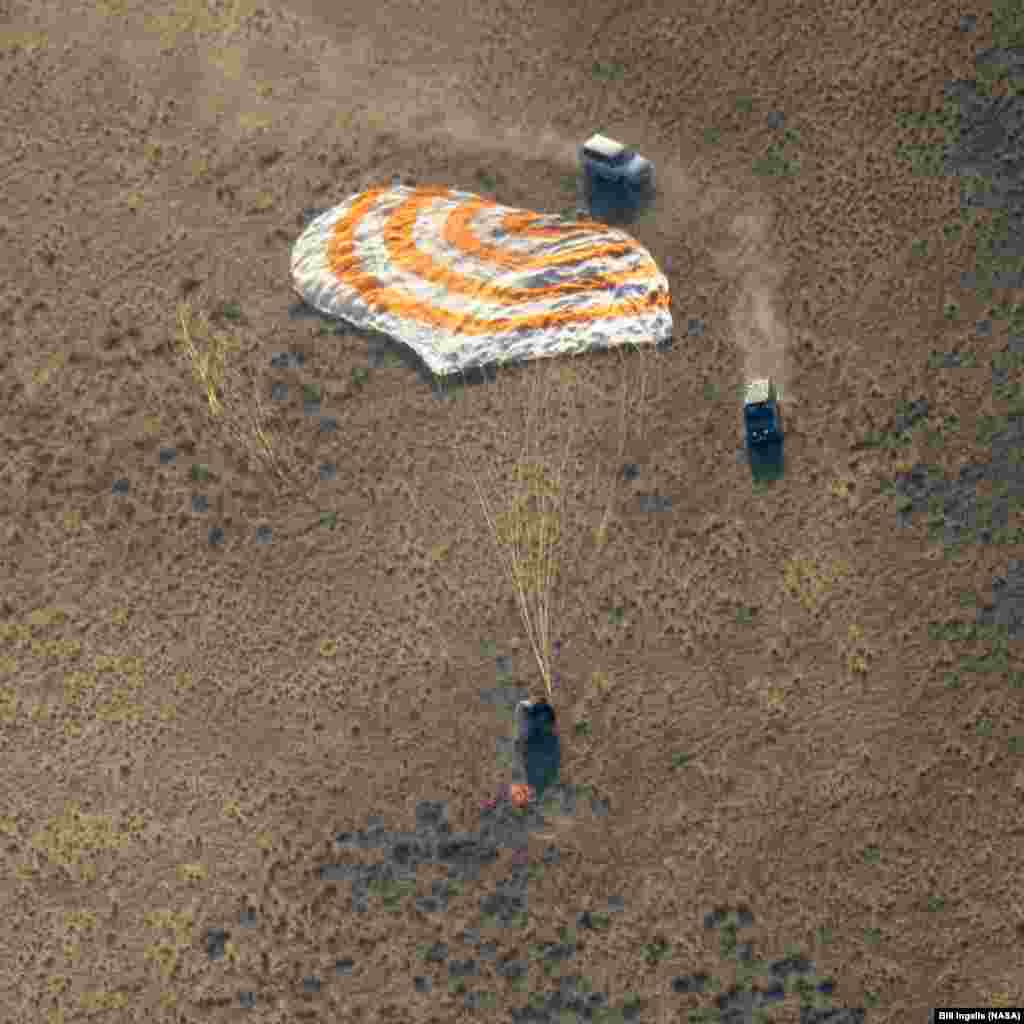 The Soyuz MS-12 spacecraft is seen as it lands near the town of Zhezkazgan, Kazakhstan, with Expedition 60 crew members Nick Hague of NASA and Alexey Ovchinin of Roscosmos, along with visiting astronaut Hazzaa Ali Almansoori of the United Arab Emirates.