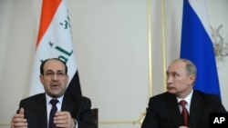 Tổng thống Nga Vladimir Putin (phải) và Thủ tướng Iraq Nouri al-Maliki tại cuộc họp báo ở Moscow ngày 10/10/2012.