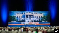 Signage is seen at the media filing center ahead of the presidential debate between Democratic presidential nominee Vice President Kamala Harris and Republican presidential candidate former President Donald Trump, in Philadelphia, Sept. 9, 2024.