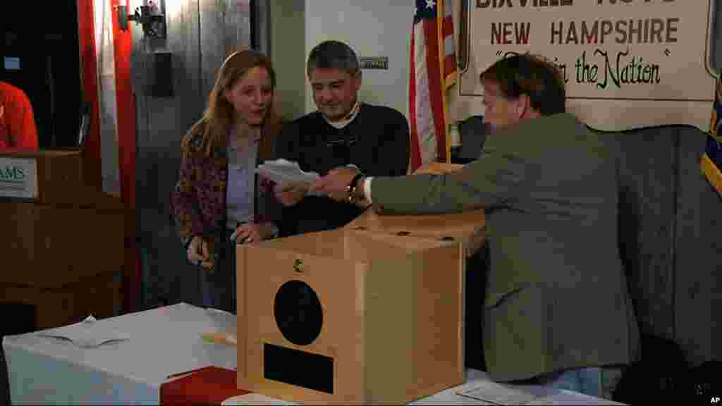 Ballots are removed from the ballot box to be counted in Dixville Notch, New Hampshire, November 6, 2012, as they cast the first Election Day votes in the nation. 