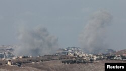 Smoke billows near Nabatieh, amid ongoing hostilities between Hezbollah and Israeli forces, as seen from Marjayoun