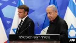 Thủ tướng Israel Benjamin Netanyahu (phải) và Tổng thống Pháp Emmanuel Macron tổ chức họp báo chung tại Jerusalem, ngày 24/10/2023.