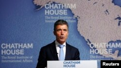 Tổng thư ký NATO Anders Fogh Rasmussen phát biểu tại London, ngày 19/6/2014. 