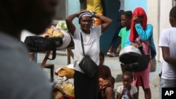 Families displaced by gang violence in Nazon take refuge in a private school in Port-au-Prince, Haiti, Nov. 14, 2024.