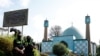 Police officers are seen in front of the "Blue Mosque", housing the Islamic Centre of Hamburg, northern Germany, on July 24, 2024, after a ban by German Interior Ministry following several months of investigation over its alleged support for Lebanon's Hez