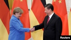 Thủ tướng Đức Angela Merkel gặp Chủ tịch Trung Quốc Tập Cận Binh hồi tháng 5/2018.