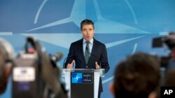 Tổng thư ký NATO Anders Fogh Rasmussen phát biểu trong cuộc họp báo tại trụ sở NATO ở Brussels, ngày 1/4/2014.