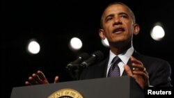 U.S. President Barack Obama speaks at the 113th VFW National Convention in Reno, Nevada, July 23, 2012. REUTERS/Larry Downing (UNITED STATES - Tags: POLITICS ELECTIONS)