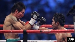 Trận đấu giữa lực sĩ Quyền Anh Antonio Margarito của Mexico và siêu sao Quyền Anh Manny Pacquiao của Philippines