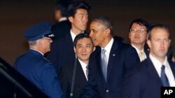 Tổng thống Mỹ Barack Obama đến sân bay quốc tế Haneda ở Tokyo, ngày 23/4/2014.