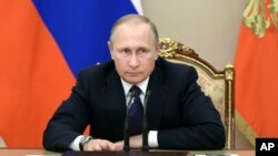 Tổng thống Nga Vladimir Putin chủ trì một cuộc họp về ngân sách trong điện Kremlin, Moscow, Nga, ngày 26 tháng 09 năm 2016.