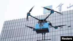 FILE PHOTO: Drone is seen during a demonstration for the media before a news conference by Chinese food delivery company Ele.me on its drone delivery service, in Shanghai