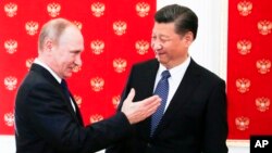 Tổng thống Nga Vladimir Putin và Chủ tịch Trung Quốc Tập Cận Bình 