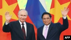 Thủ tướng Phạm Minh Chính và TT Nga, Vladimir Putin, tại Hà Nội, ngày 20 tháng Sáu, 2024.