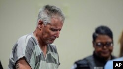 Colin Gray, 54, the father of Apalachee High School shooting suspect Colt Gray, 14, enters the Barrow County courthouse for his first appearance, on Friday, Sept. 6, 2024, in Winder, Ga. 