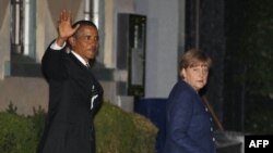 Tổng thống Obama và Thủ tướng Merkel sau bữa ăn tối tại một nhà hàng sang trọng ở khu Georgetown của Washington, ngày 6/6/2011