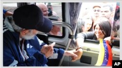 A screen capture from Cuba's website Cubadebate shows Fidel Castro in Havana, greeting supporters on March 30, 2015. 