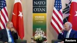 FILE PHOTO: U.S. President Joe Biden meets with Turkish President Tayyip Erdogan at the NATO summit in Vilnius