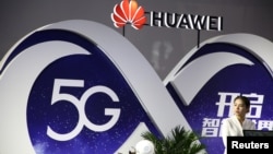 Huawei featuring 5G technology at the PT Expo in Beijing, China, Sept. 28, 2018.