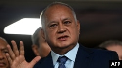 (FILES) Venezuelan deputy Diosdado Cabello gestures while leaving the Supreme Court of Justice (TSJ) in Caracas on August 9, 2024.